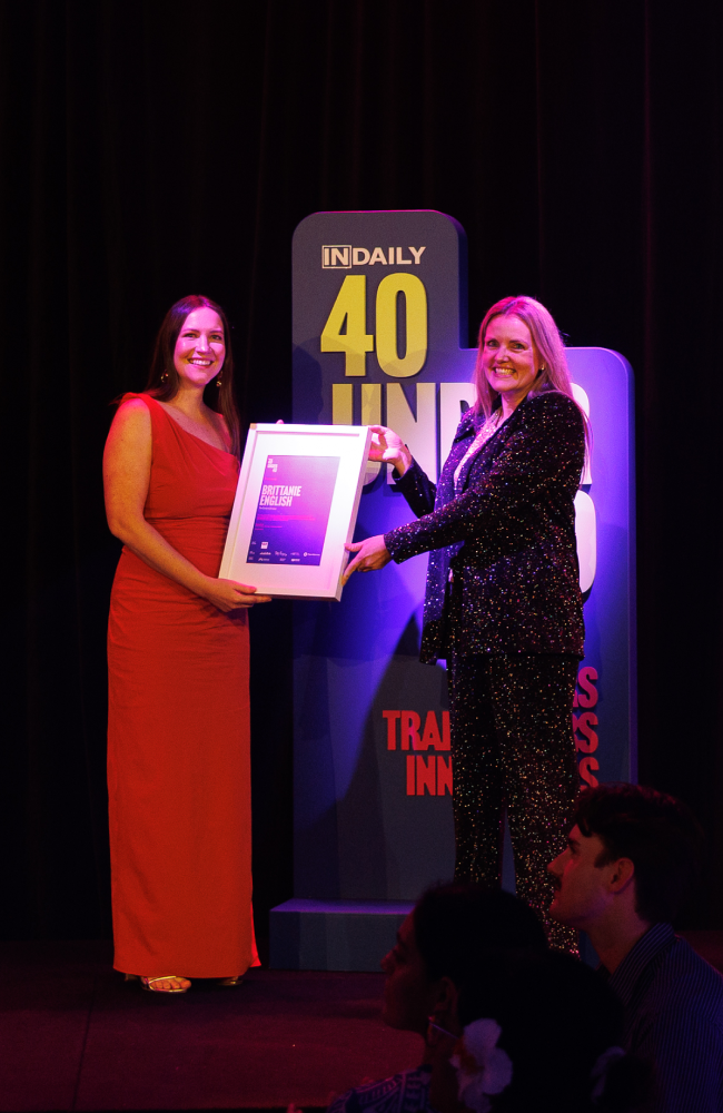 Brittanie English 40 Under 40 on media wall